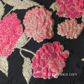 Tessuto jacquard in jersey floreale nero rosa rosso